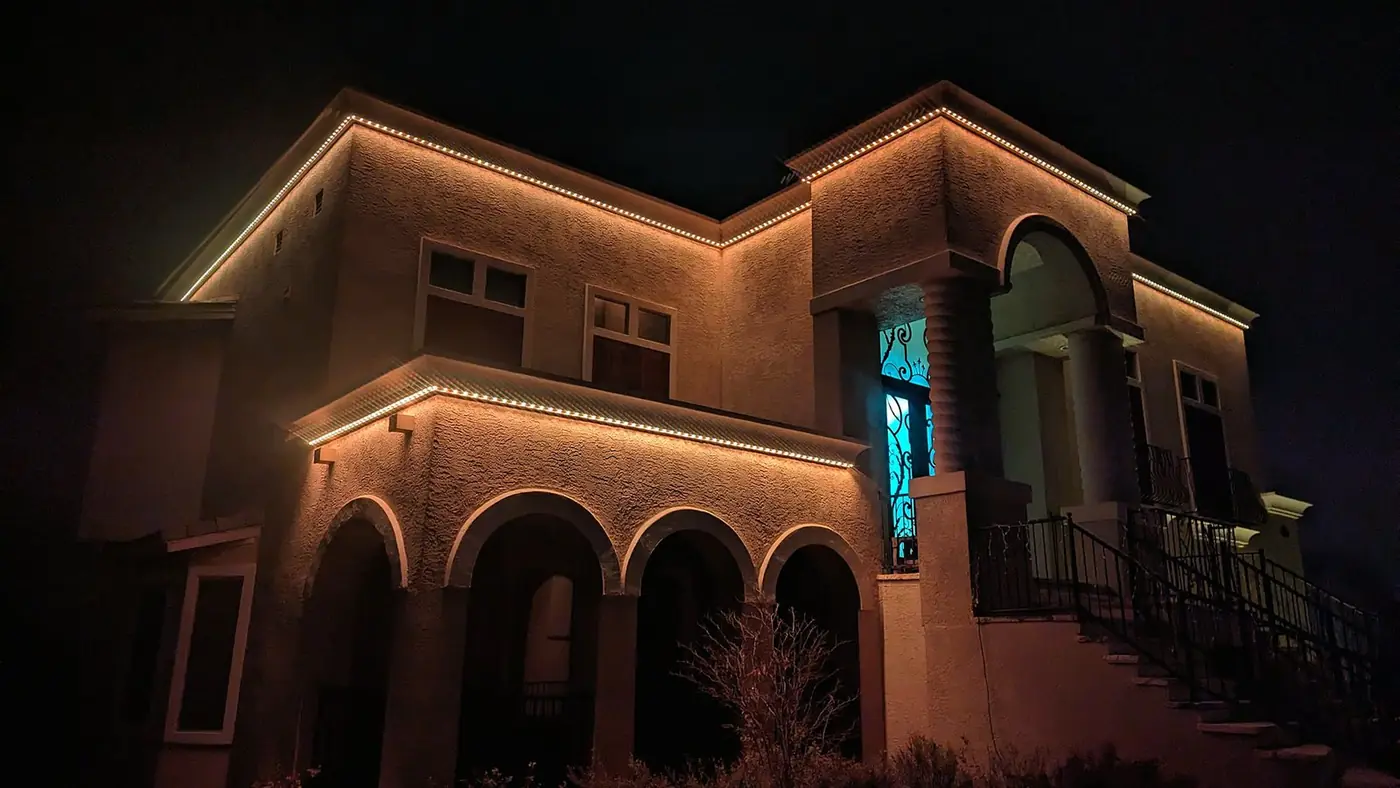 Warm gold roofline accent lighting