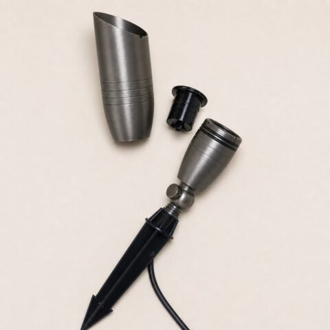 BHL 24V RGBW smart landscape light with solid brass housing, black stake, and replaceable LED module